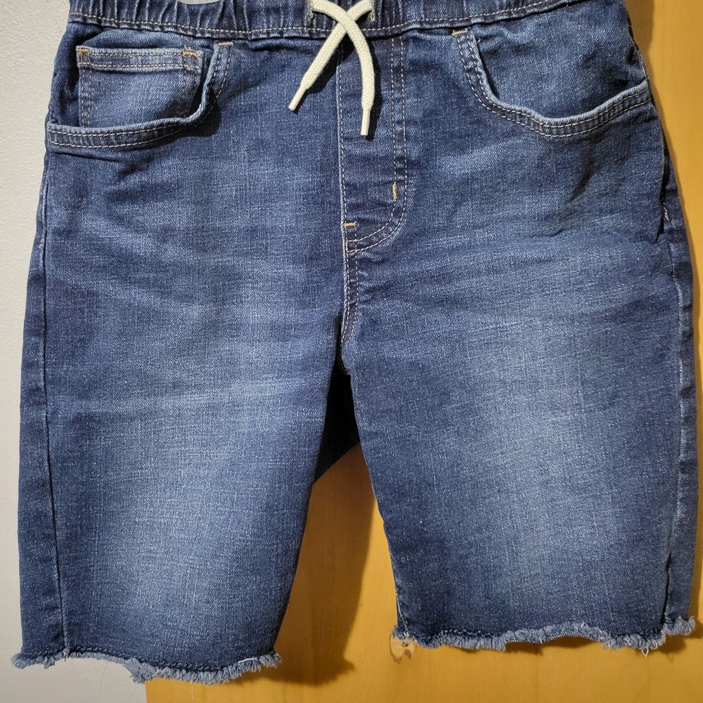 Like new Old Navy blue jean shorts with fringe ends, draw string waist